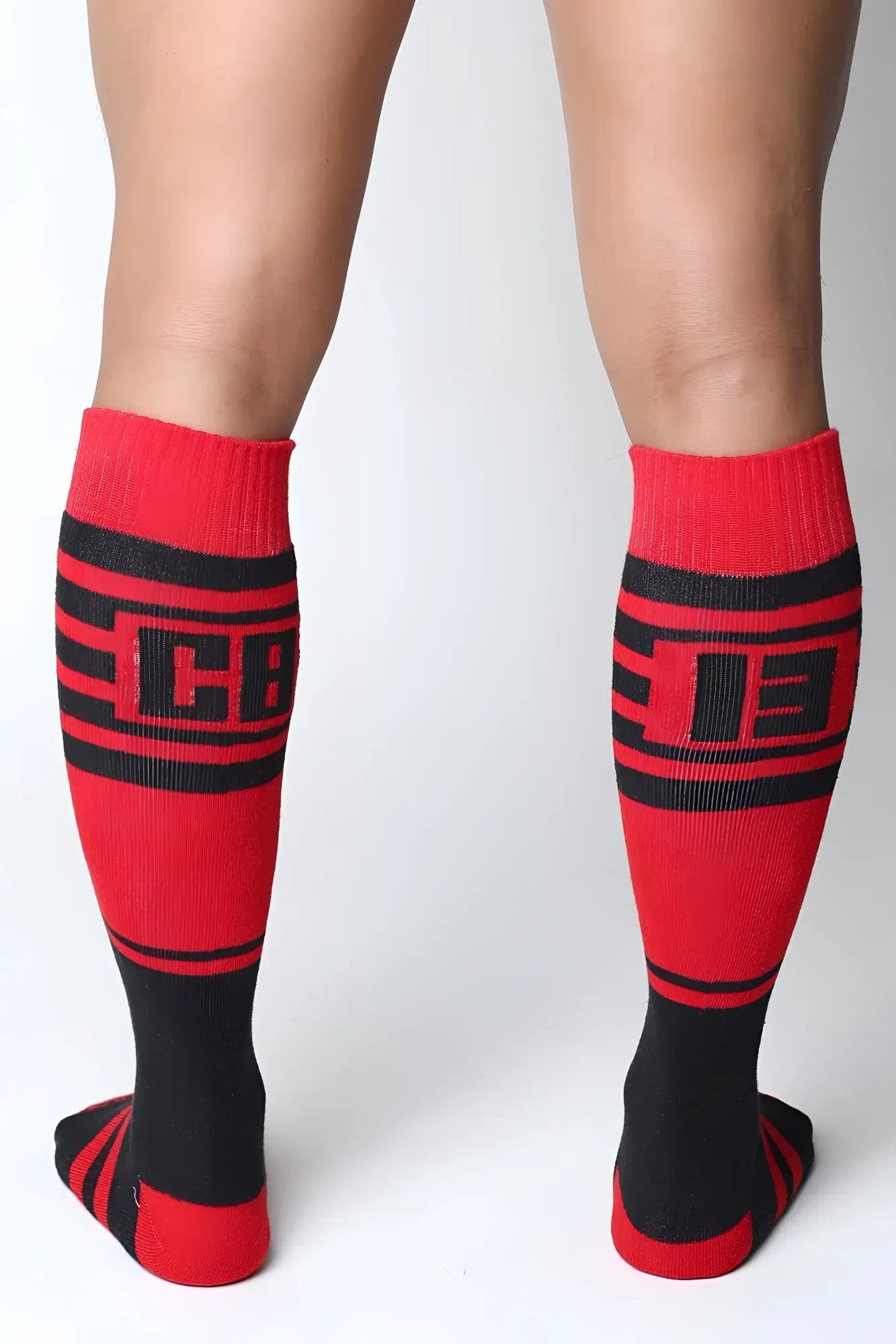 Midfield knee high socks in red and black with bold stripes and a cb logo on the calf in 7 colors