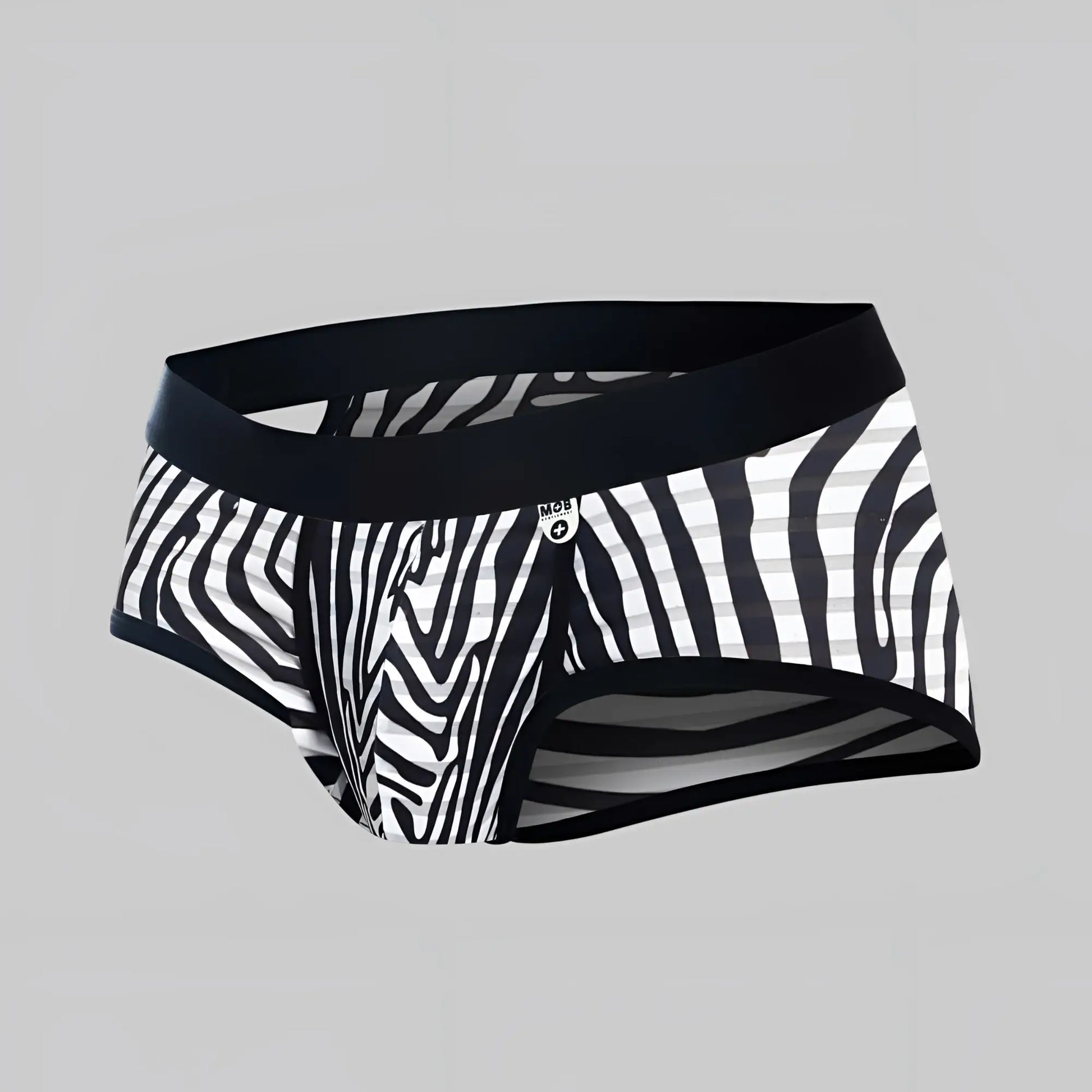 Black and white zebra-striped men’s briefs with a solid black waistband mob aero brief front view