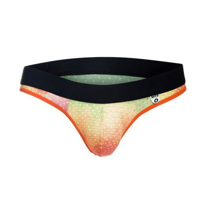 MOB Aero Jock vibrant gradient briefs with black waistband orange trim and white polka dots front view