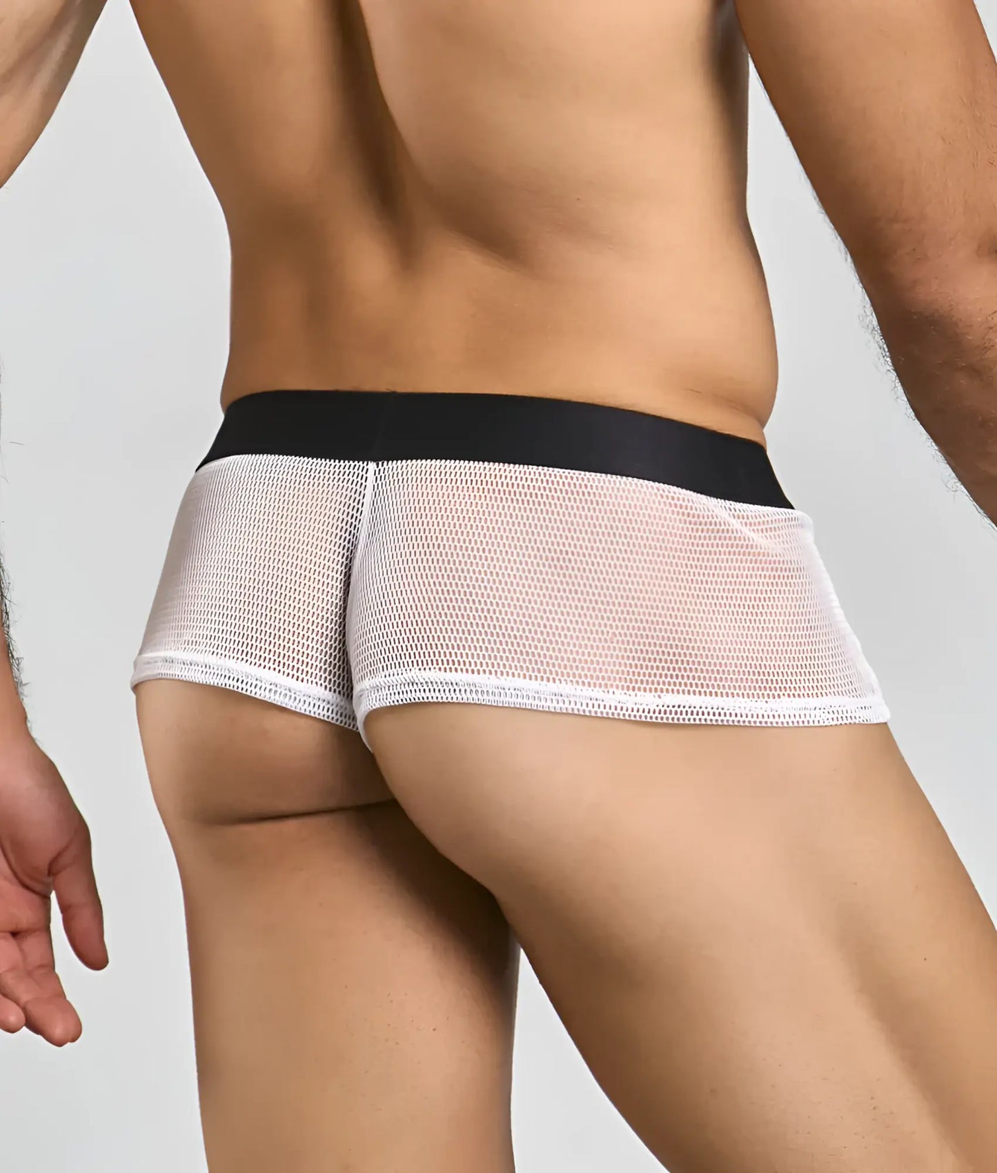White mesh briefs with black waistband mob fishnet boxer showcasing breathable fishnet material and stylish design