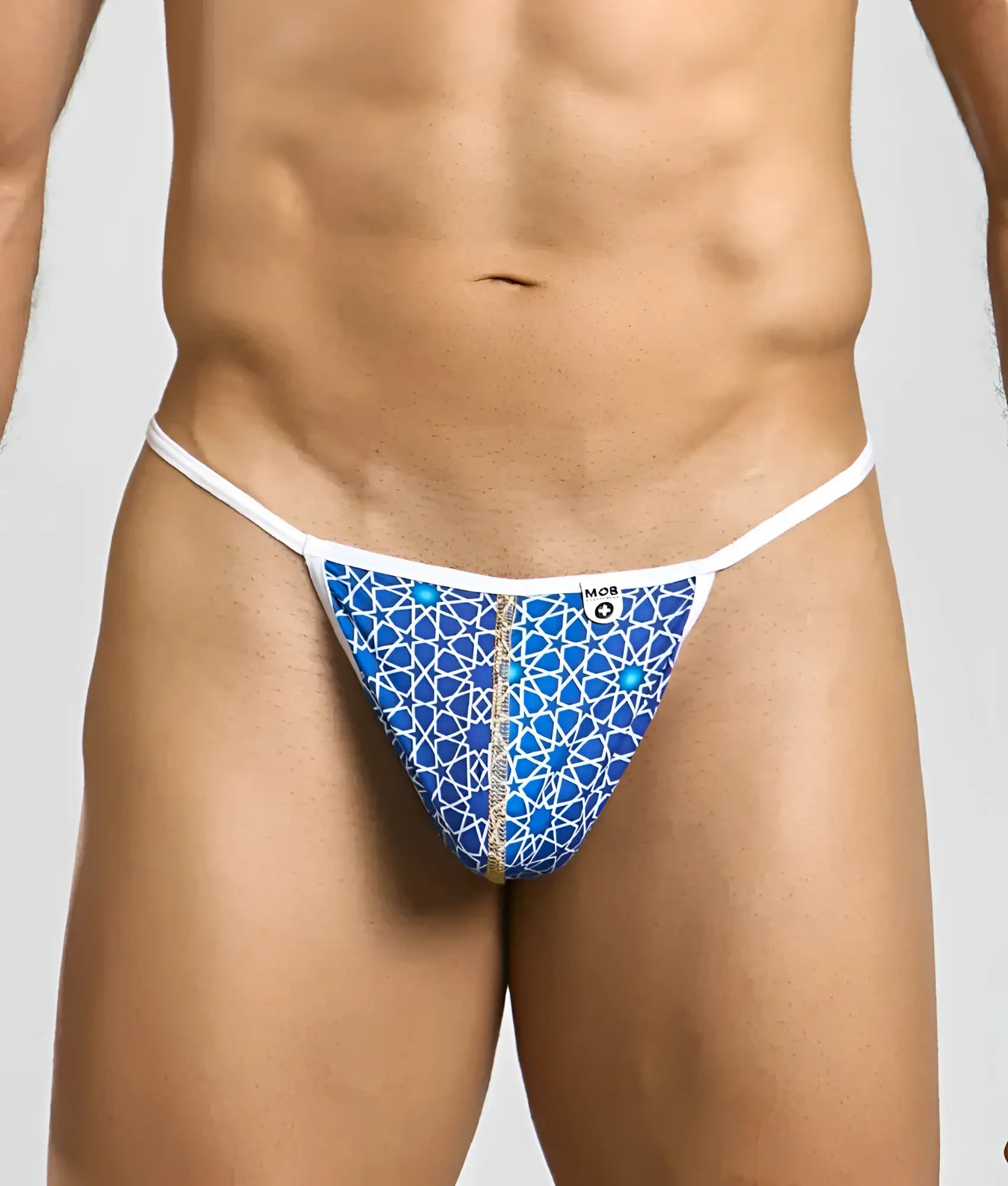 Blue patterned MOB hipster T thong with white trim and gold zipper featuring intricate geometric design