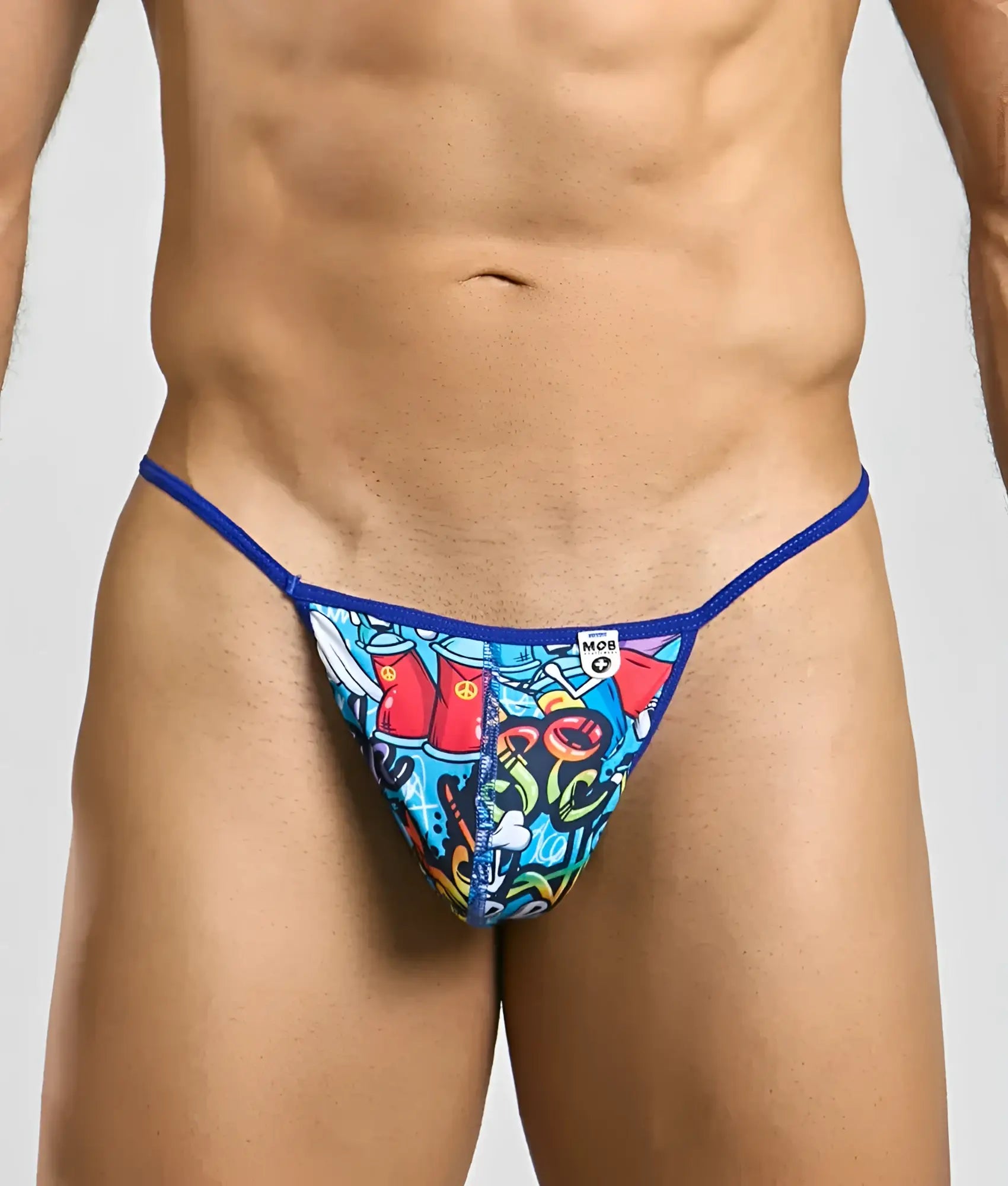 Vibrant blue and multicolored graffiti patterned hipster t thong with royal blue waistband featuring mob logo