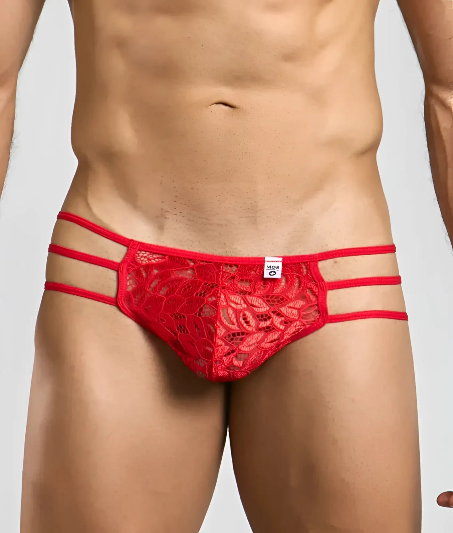 MOB men’s red lace pouch thong featuring a floral pattern and three horizontal straps