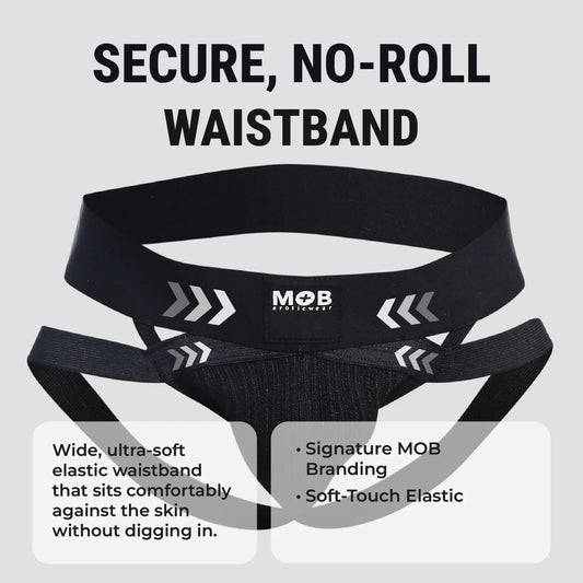 Men’s x jockstrap with black elastic waistband featuring white arrow graphics and mob eroticwear branding back side view