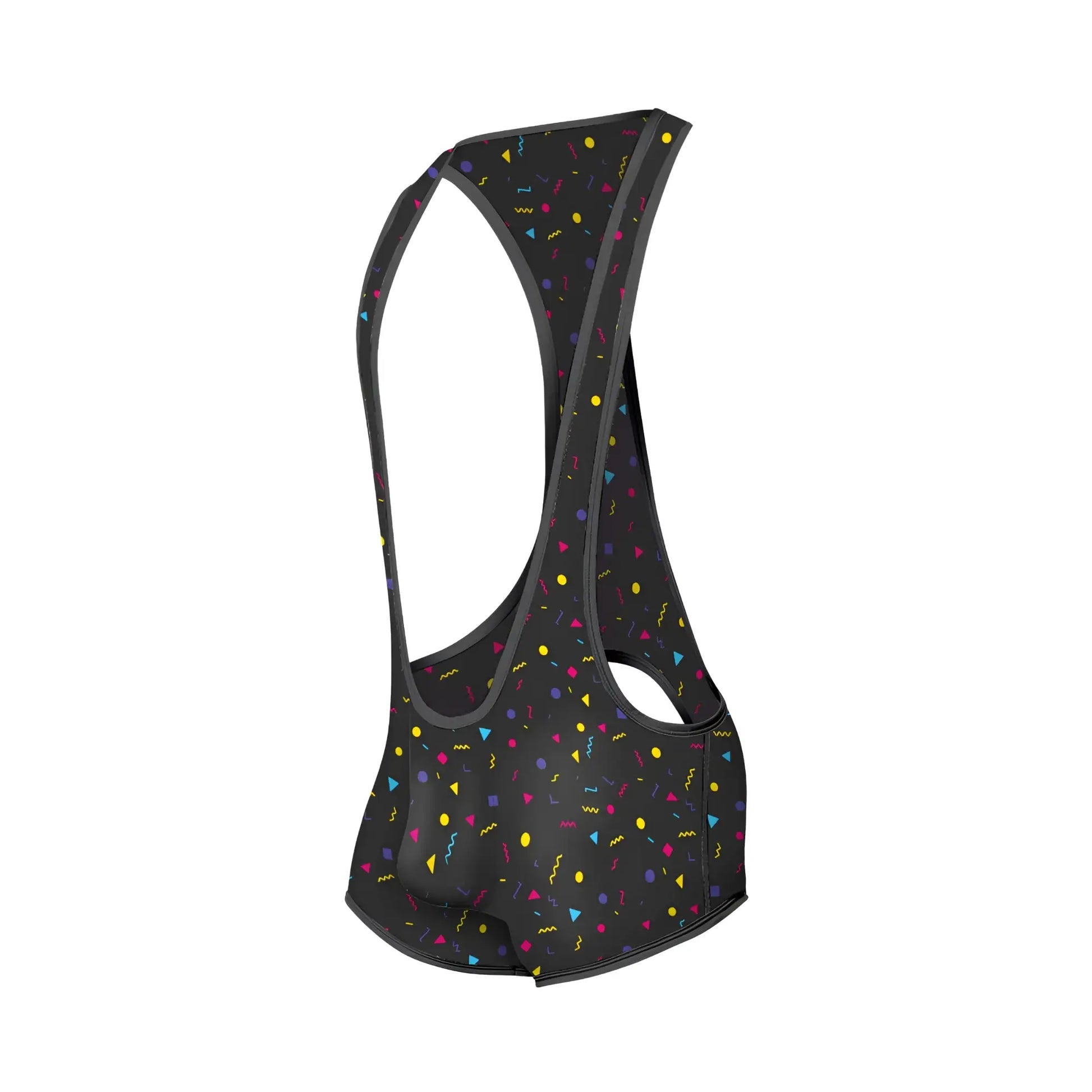 Black cycling bib shorts with vibrant multicolored confetti pattern featuring yellow pink blue and purple geometric shapes