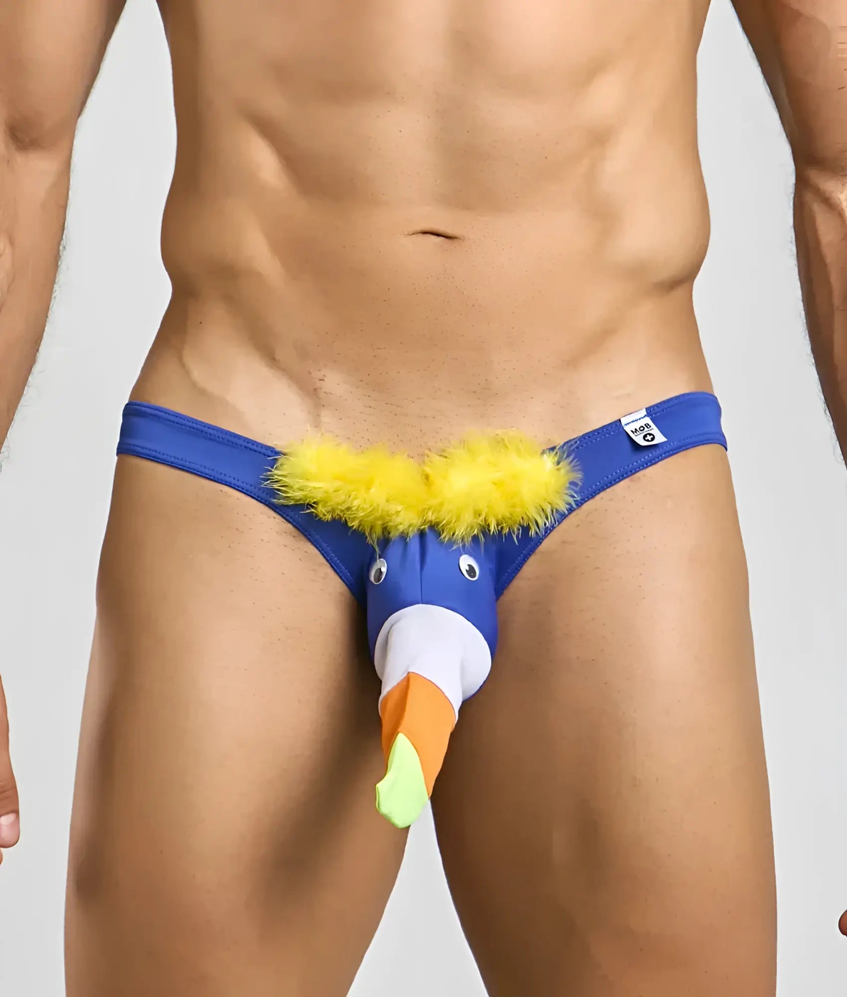 Toucan bikini for men featuring a blue toucan-themed thong with yellow feathered crest and orange and green beak design