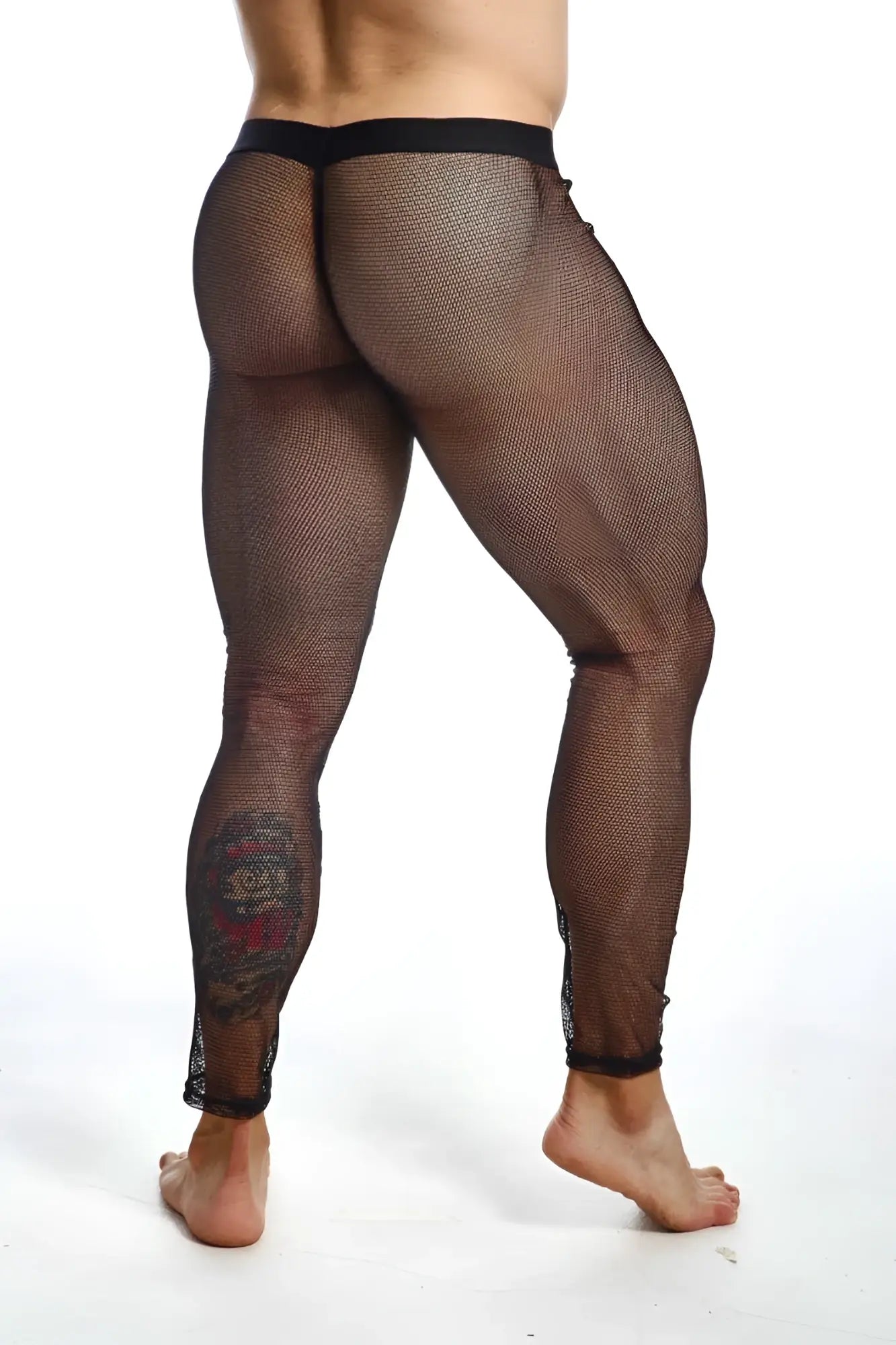 Black mesh mob fishnet tights with lace floral design on lower leg made of sheer breathable fabric