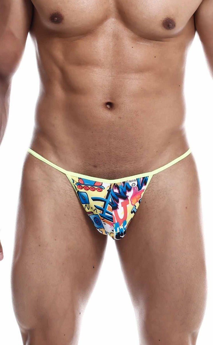 Bright yellow mob hipster t thong print with vibrant graffiti-style colorful cartoon characters and bold lettering