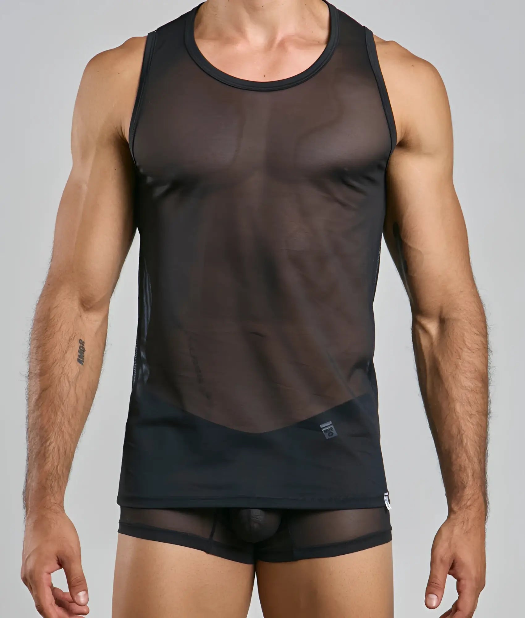 Black sheer mesh tank top with solid black trim and waistband from mob lace tank top collection