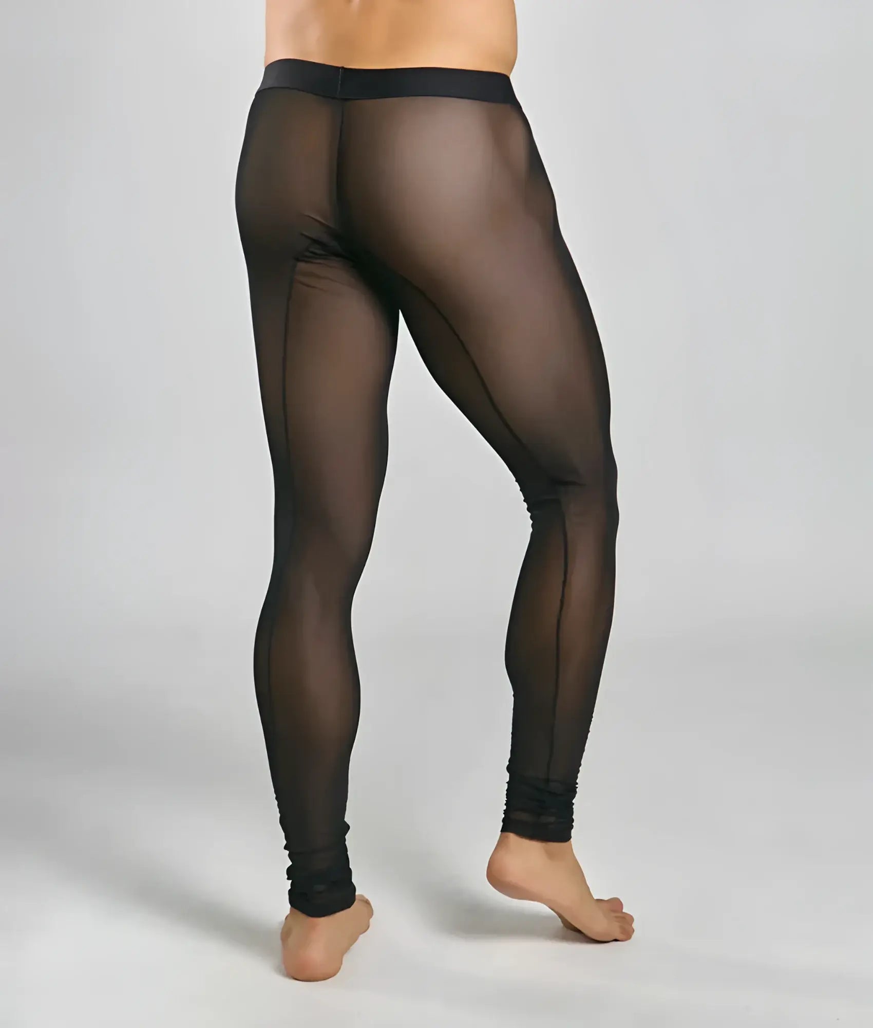 Black sheer mesh tights with solid black waistband and ankle cuffs from the mob collection