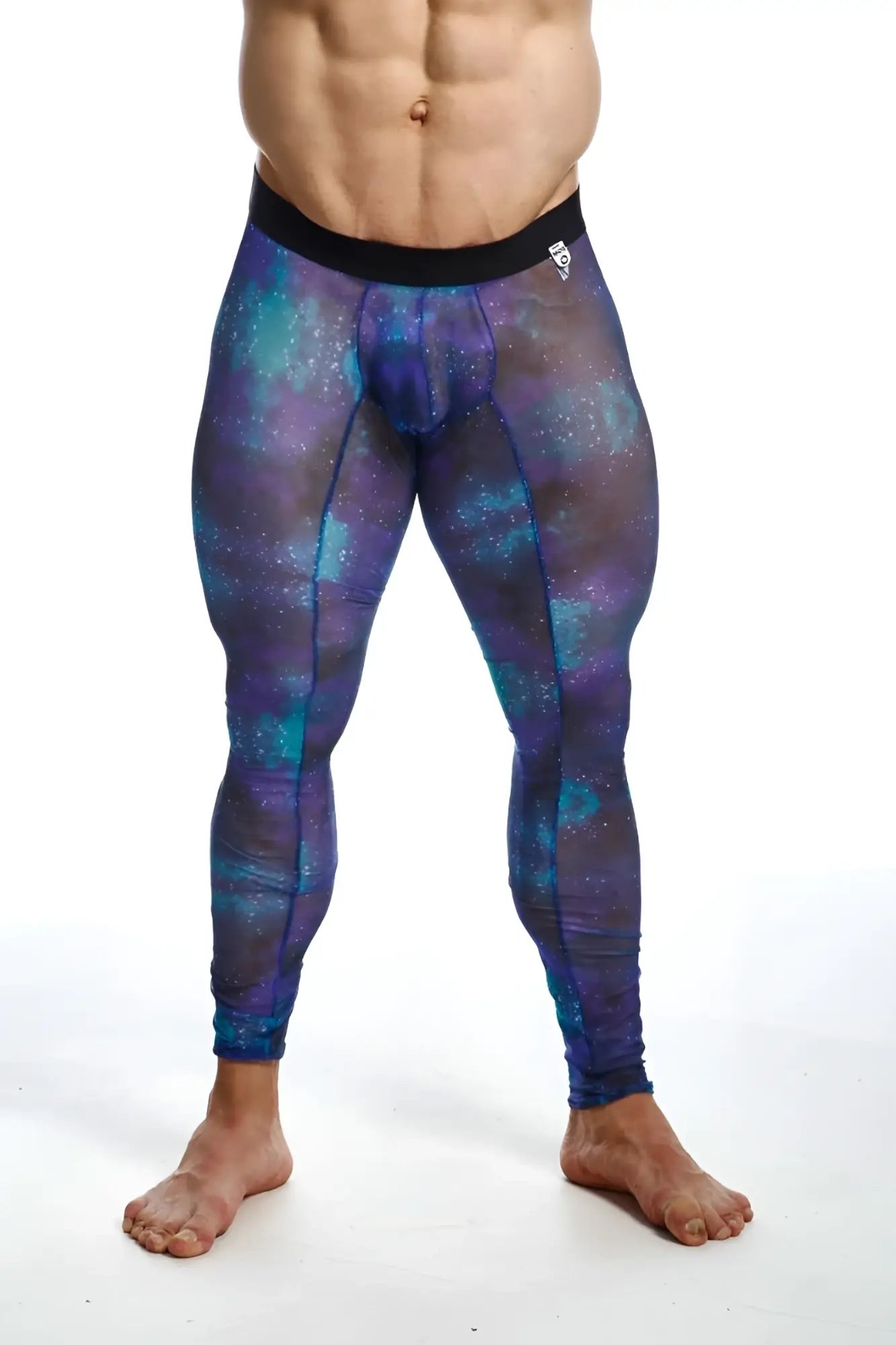 Purple and teal galaxy-patterned mob mesh tights compression leggings with black waistband shown from the back