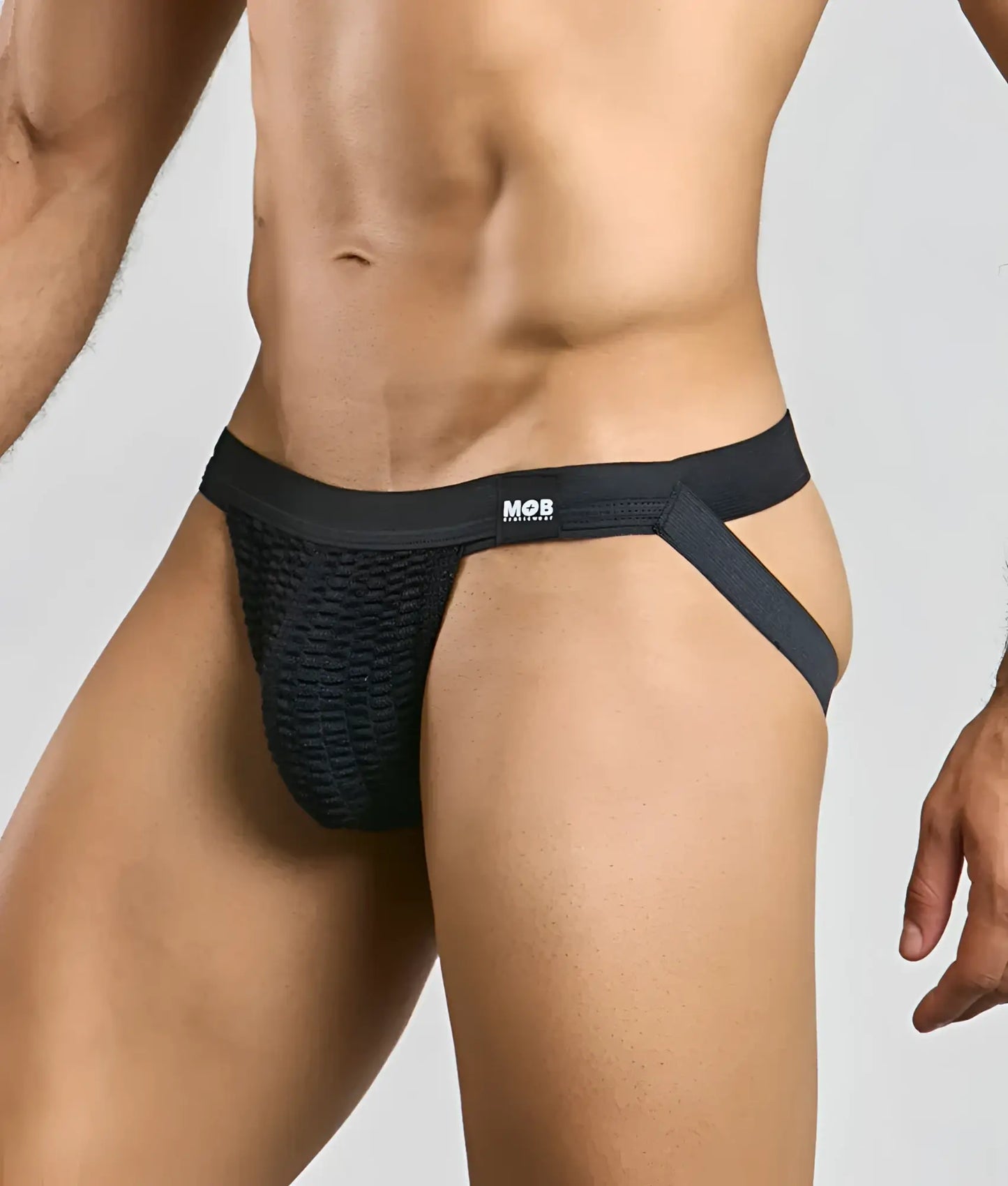 Black mesh mob swim jockstrap briefs with supportive elastic waistband side straps and mob brand logo