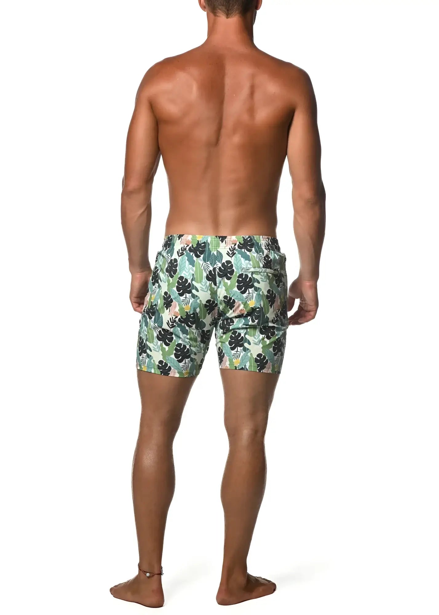 Men’s Moritz 6 inch inseam swim shorts with light green and black tropical leaf pattern for beachwear