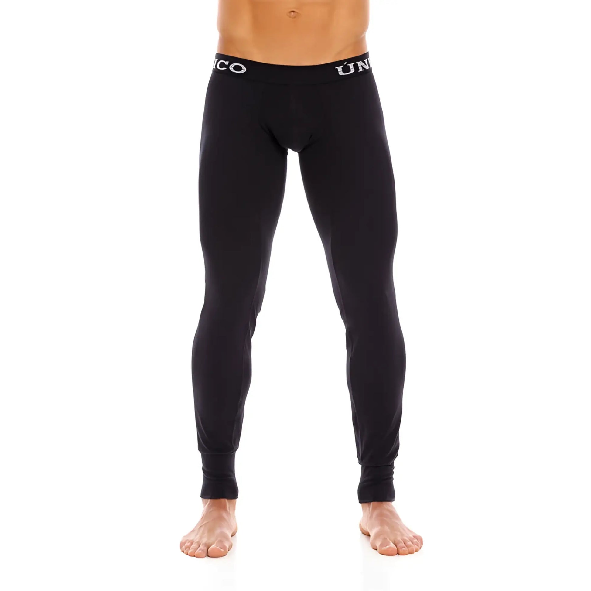 Black uniqlo mundo unico cold mountain compression tights with snug fit and white logo trim at waistband size one size