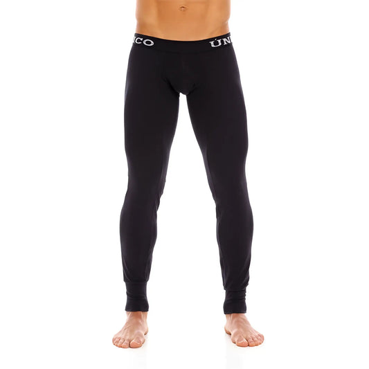 Black uniqlo mundo unico cold mountain compression tights with snug fit and white logo trim at waistband size one size