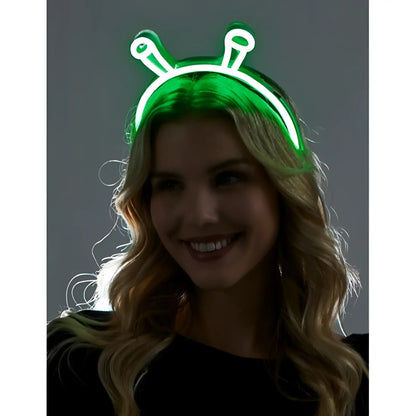 Green neon alien headband with glowing antennae featuring bright luminous green plastic for party wear