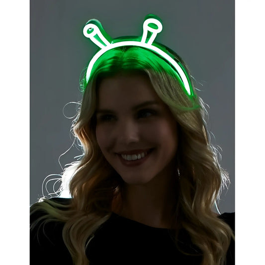 Green neon alien headband with glowing antennae featuring bright luminous green plastic for party wear