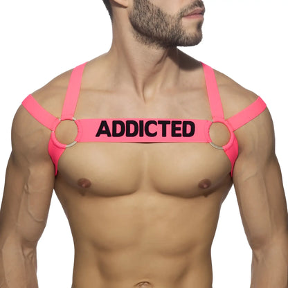 Bright pink neon multi band harness with black addicted text across the chest for edgy streetwear style