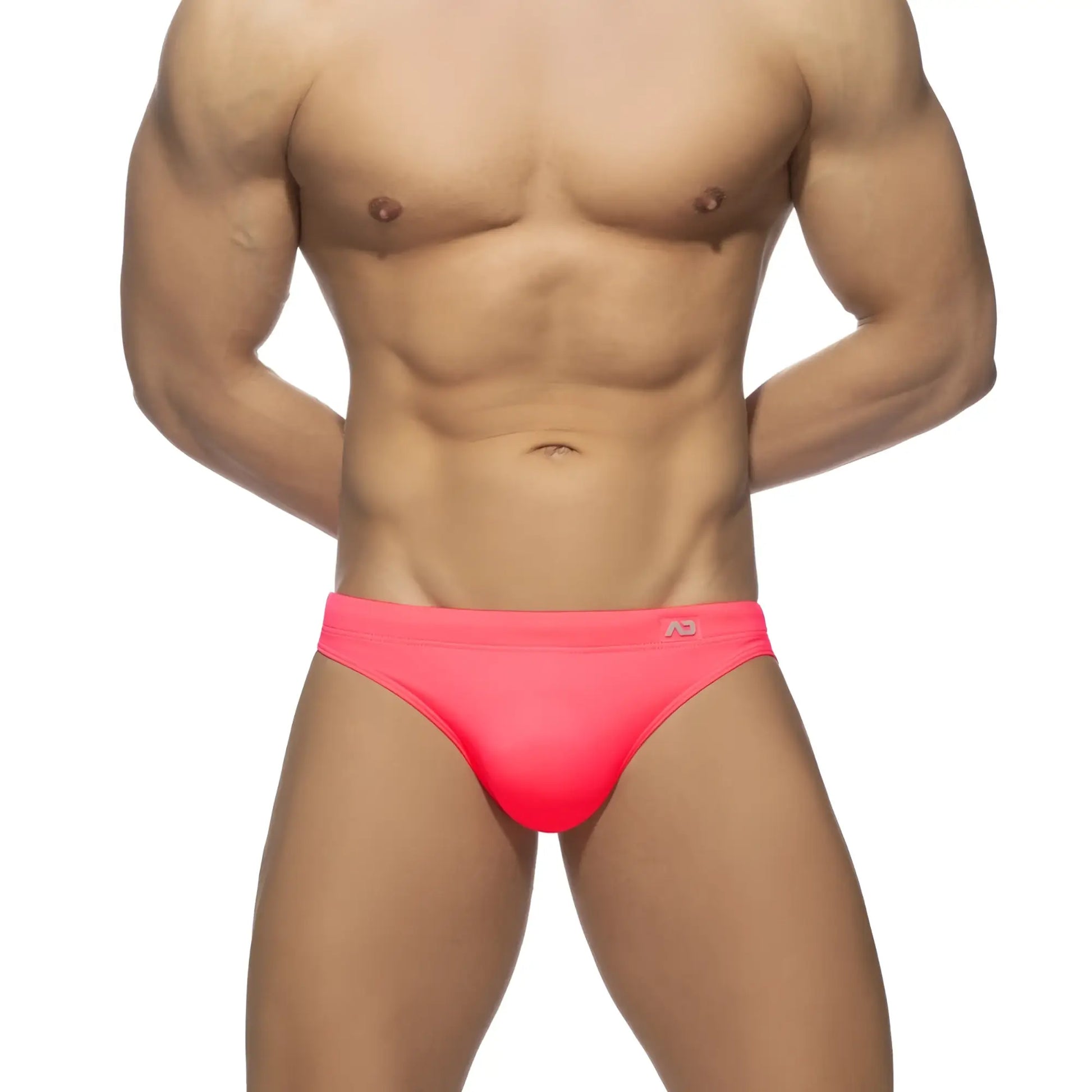 Neon swim bikini bright pink swim trunks with snug fit and small logo on waistband for stylish beachwear