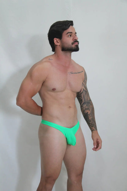 Neon swim thong vibrant neon green briefs with snug form-fitting design available in four colors