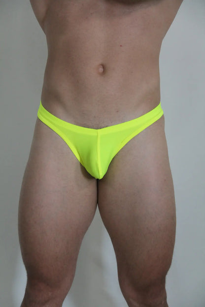 Neon yellow swim thong briefs in stretchy fabric shown from the back available in four vibrant colors