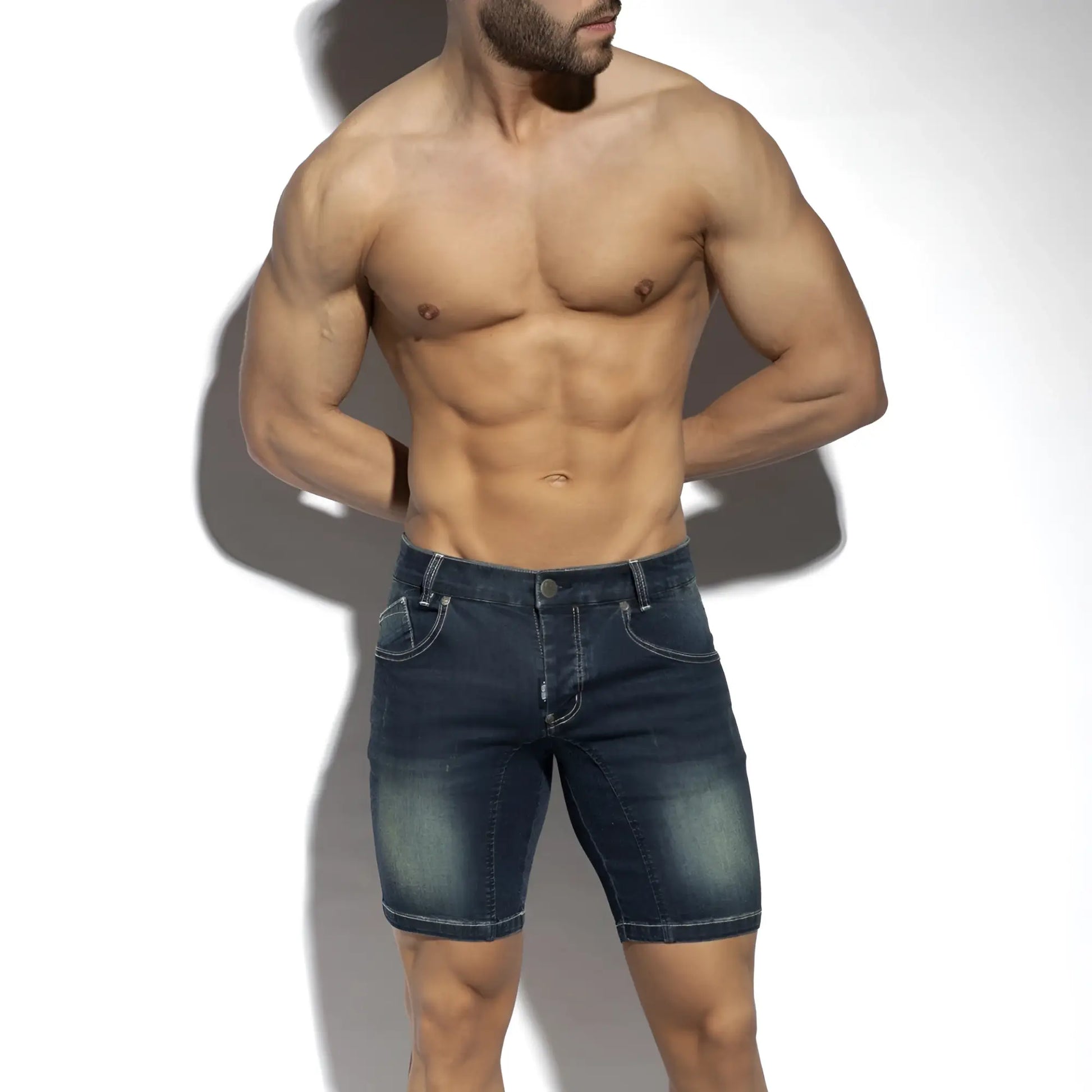 Dark blue denim bermuda jeans shorts with faded wash and classic stitching in a new casual style