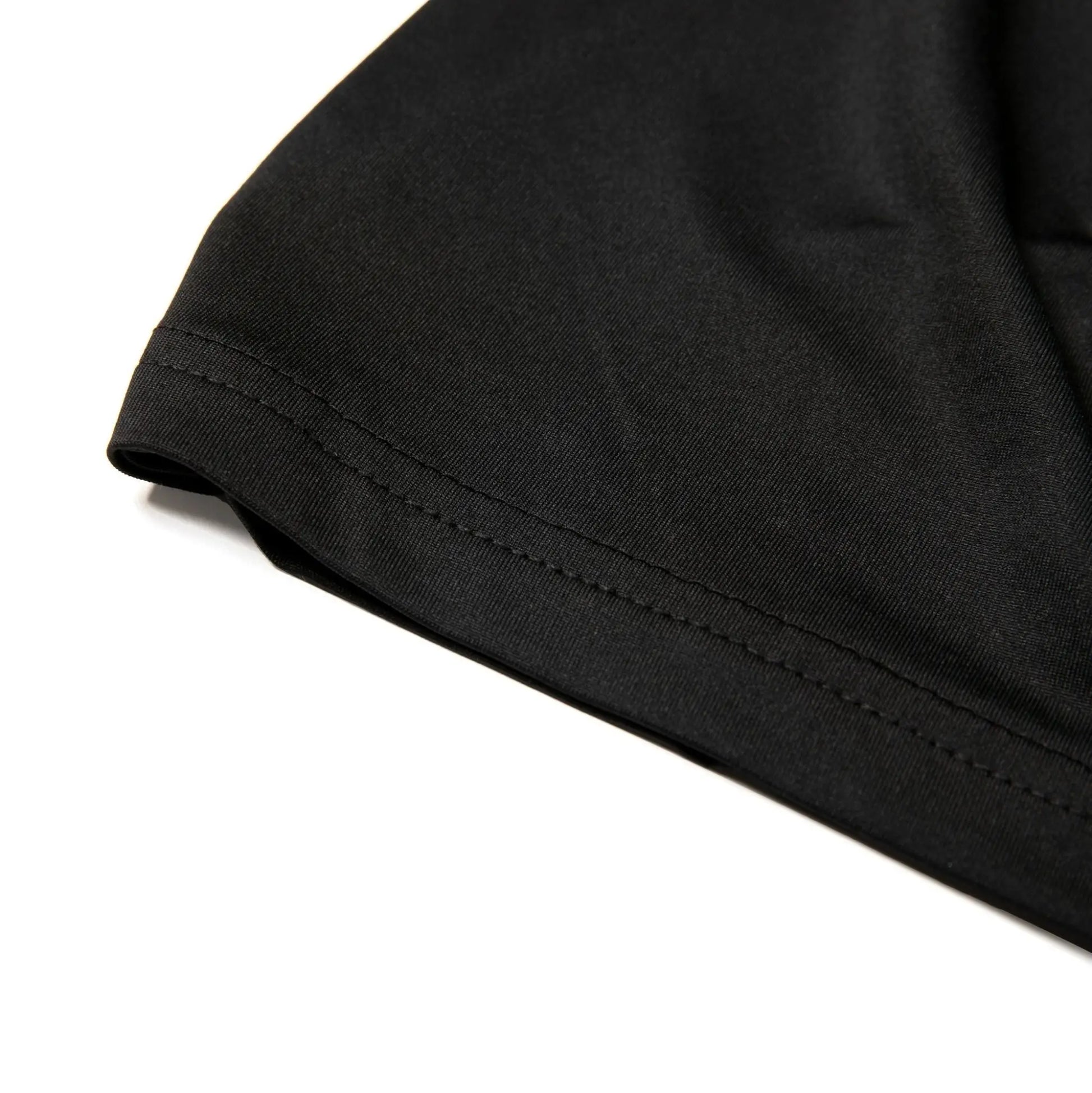 Black nylon active tank top sleeve with neatly stitched hem made for comfortable activewear use