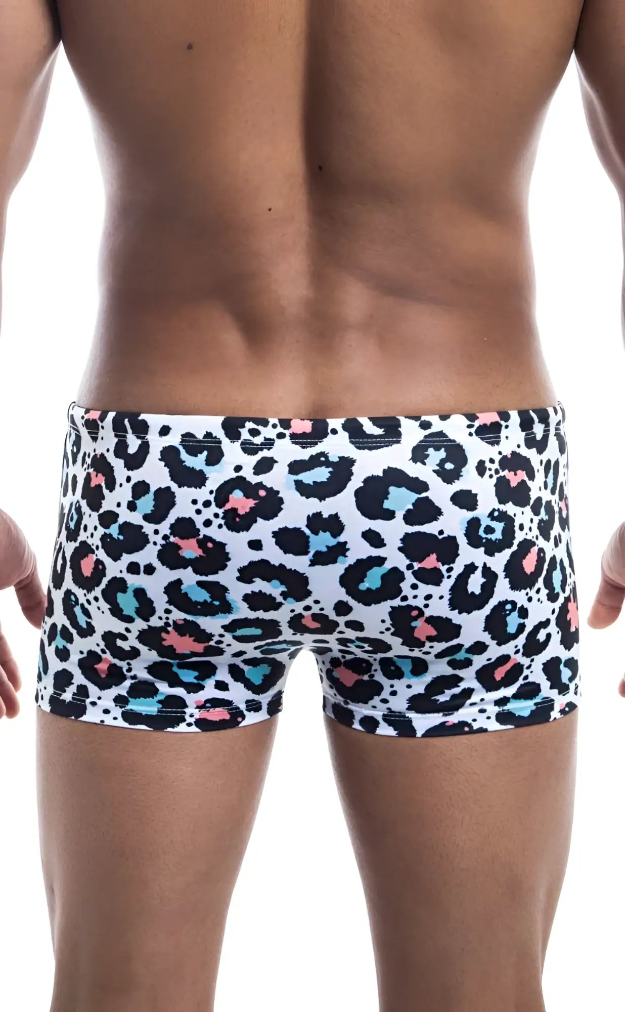 Oceanico square cut white swim trunks with bold leopard print in black teal and pink spots