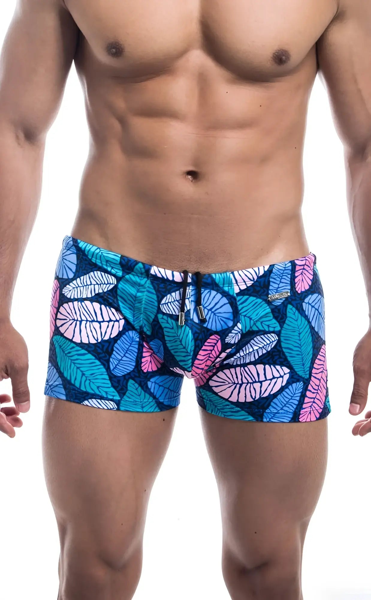 Oceanico square cut swim trunks with blue and pink leaf pattern on dark blue base for casual beachwear