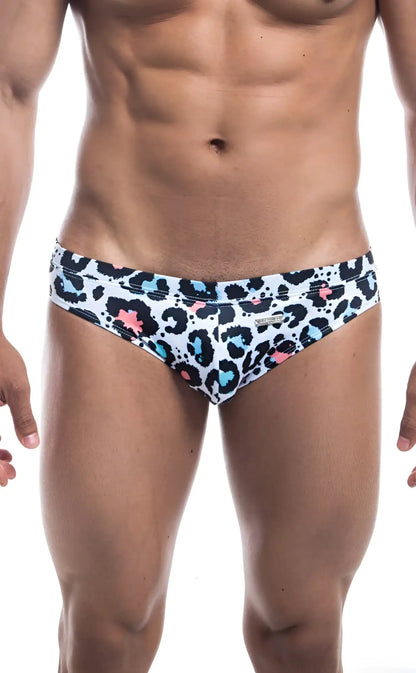 White swim trunks with bold leopard print black spots and bright blue pink accents oceanico swim bikini
