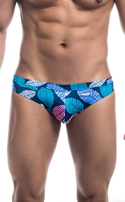 Oceanico swim bikini featuring blue and pink leaf-patterned swim trunks with vibrant tropical design for beachwear