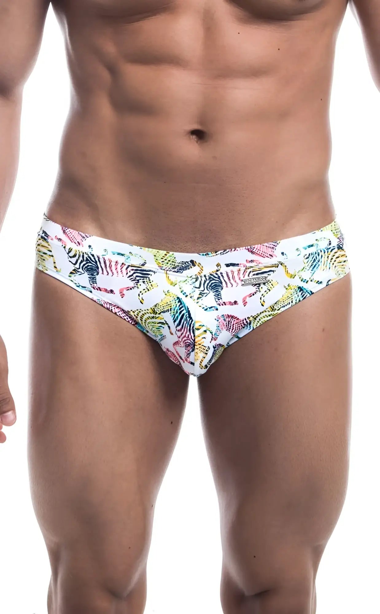 White swim trunks with a vibrant multicolored zebra print pattern from Oceanico Swim Bikini collection