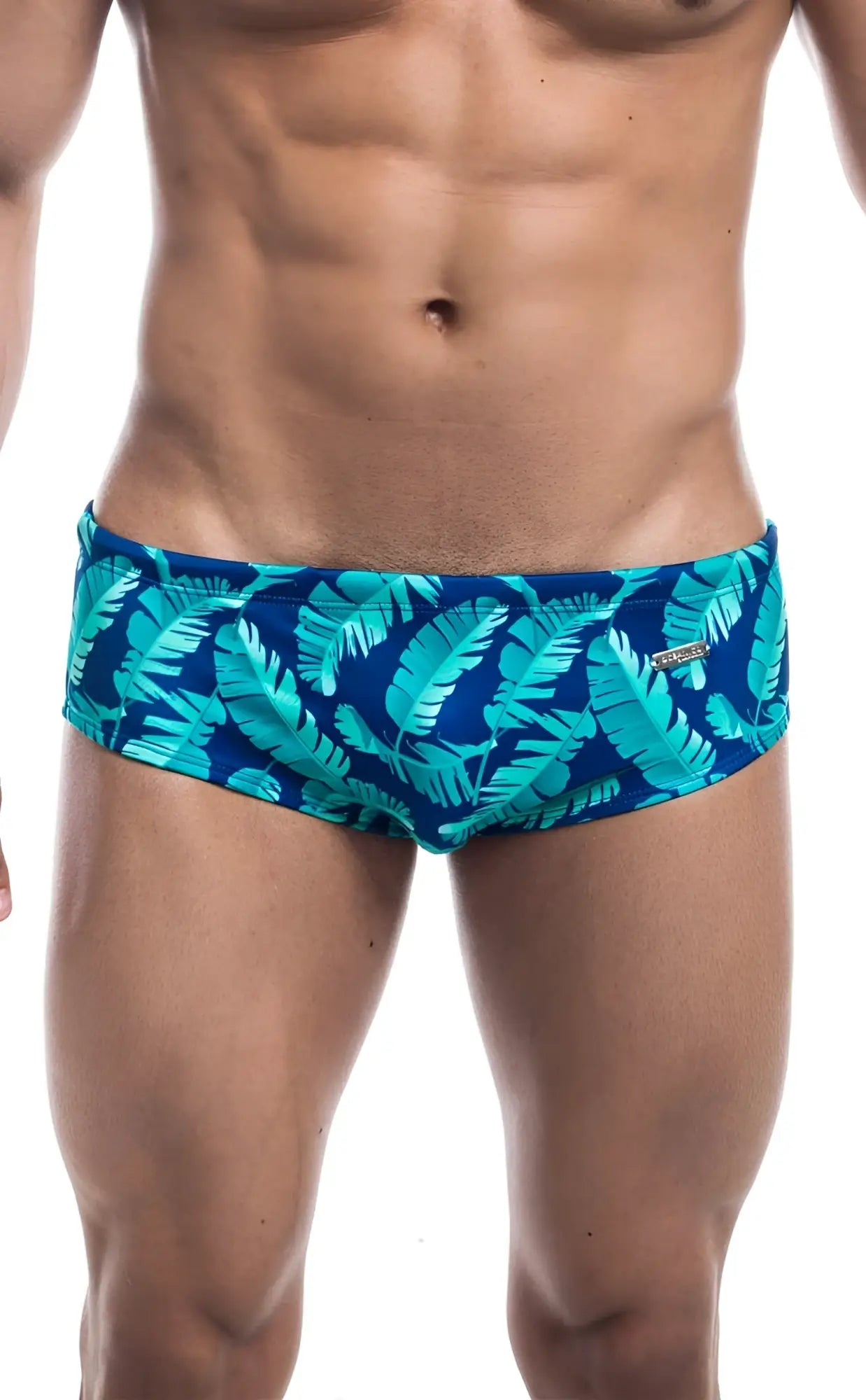 Oceanico swim brief blue swim trunks with vibrant turquoise tropical leaf pattern for beach and pool use