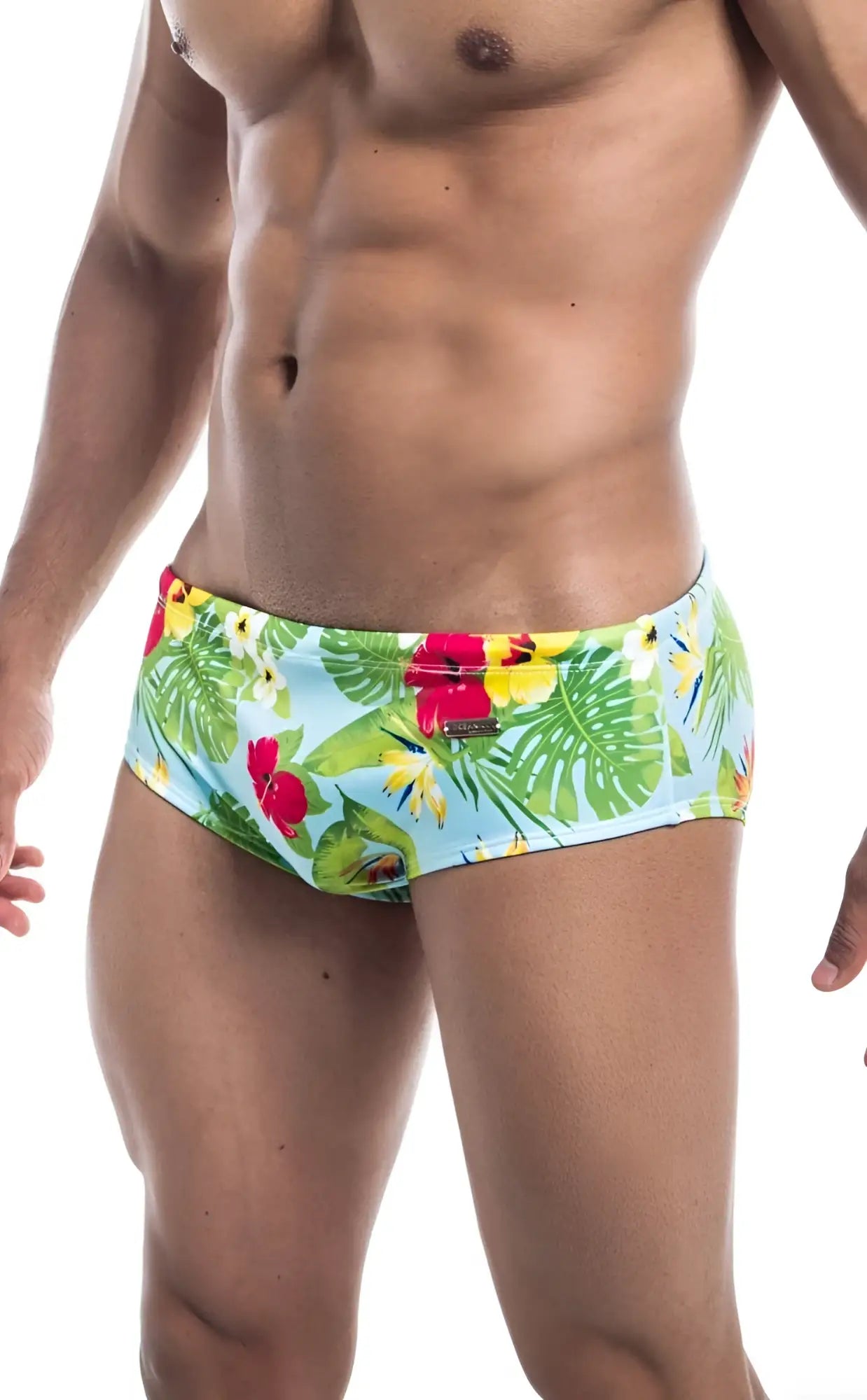 Oceanico swim brief featuring brightly colored tropical print swim trunks in light blue green red and yellow for beachwear