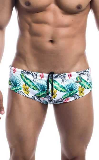 White oceanico swim brief with vibrant tropical pattern of green palm leaves yellow flowers and black and white zebras