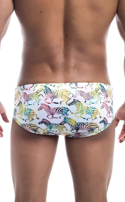 Oceanico swim brief white swim trunks with vibrant rainbow-colored zebra pattern for beach and pool wear