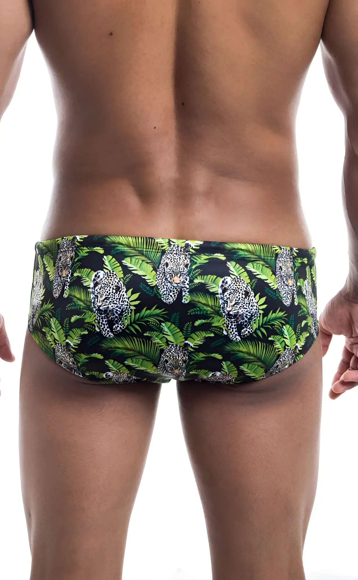 Oceanico swim brief in green and black with vibrant jungle pattern featuring leopards and tropical leaves