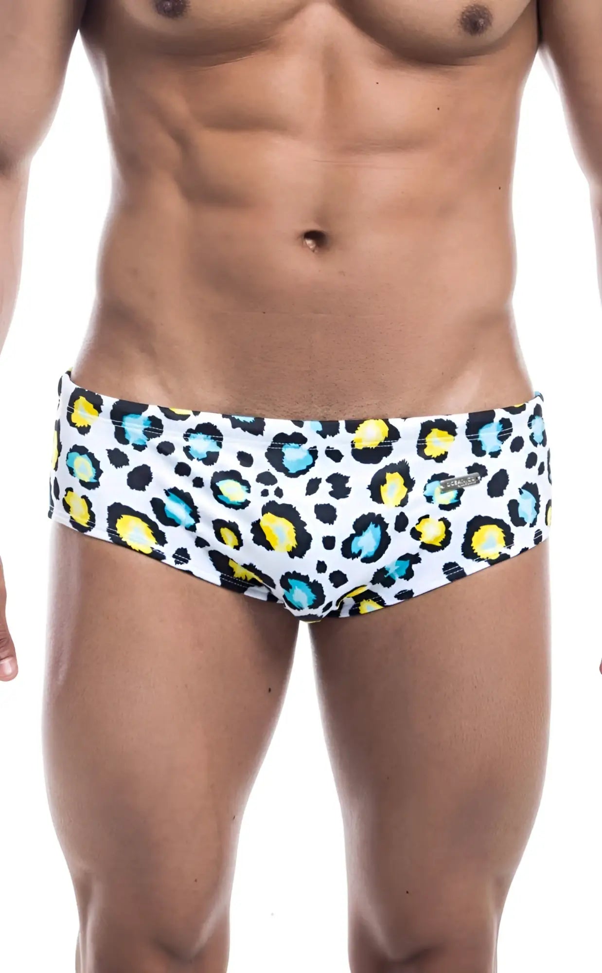 White Oceanico swim brief featuring bold leopard print with yellow and teal spots for stylish swimwear use