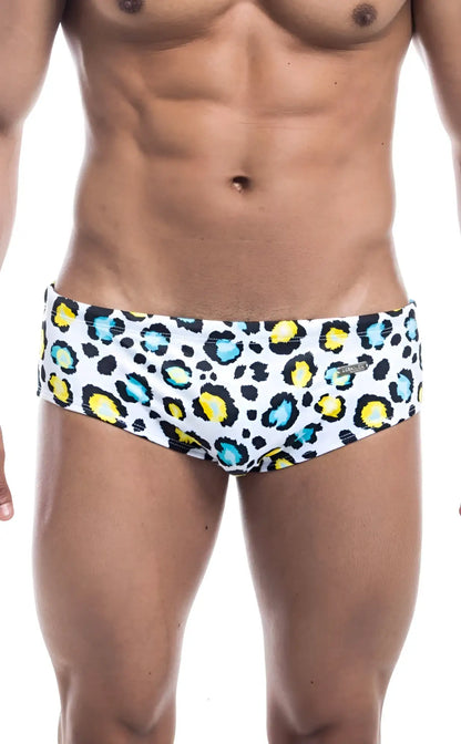 White Oceanico swim brief featuring bold leopard print with yellow and teal spots for stylish swimwear use