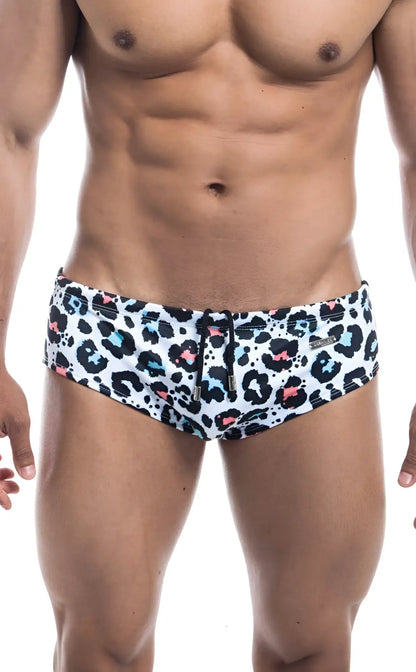 Oceanico swim brief in white featuring bold leopard print with black spots and pink and light blue accents