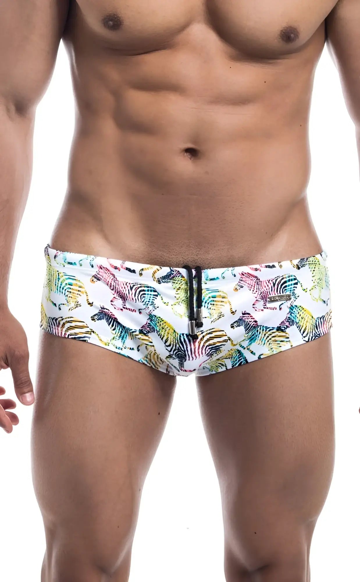 Oceanico swim brief in white with vibrant multicolored zebra pattern and black zipper closure
