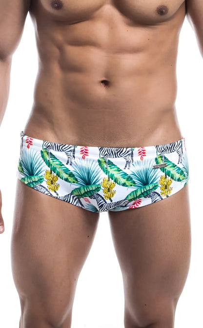 Oceanico swim brief in white featuring a vibrant tropical pattern with palm leaves bananas flowers and zebras
