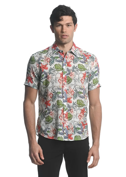 A men’s short-sleeved button-up shirt with a vibrant tropical floral pattern in red green and pink on beige Tencel linen