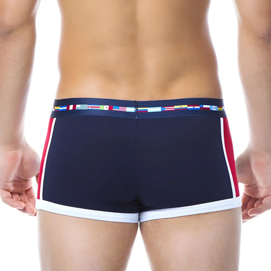 Navy blue Papi Viva Heritage Brazilian swim trunks in size S with red and white side stripes and a colorful flag waistband
