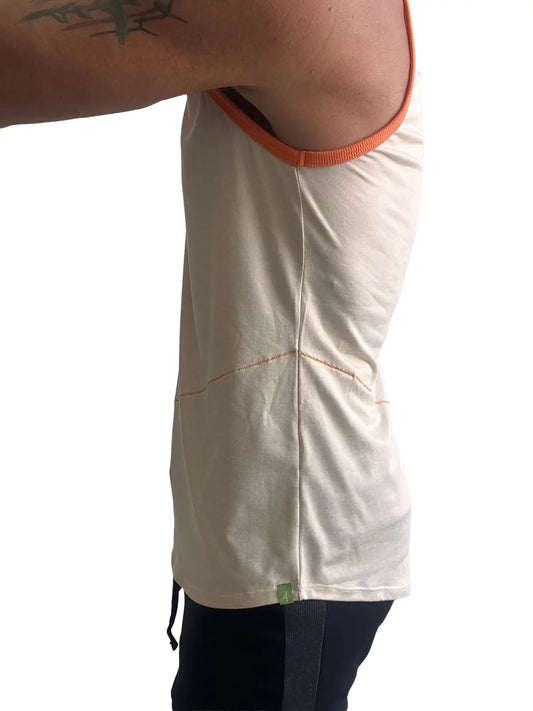 Cream-colored tank top with orange ribbed trim and subtle stitching details in sand beige perfect tank design