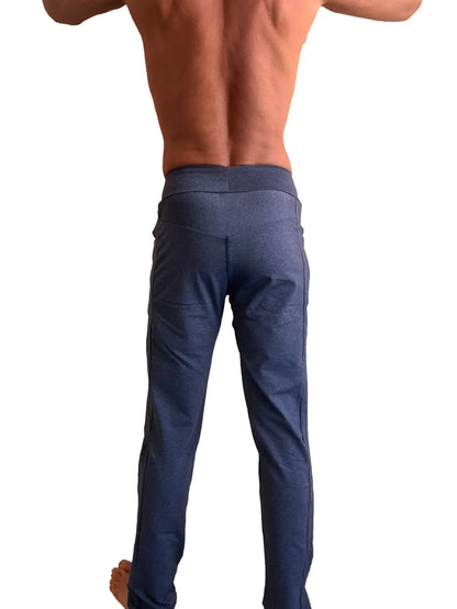 Dark blue slim-fit performance track and lounge sweat pant with stretchy waistband and subtle side seam detailing