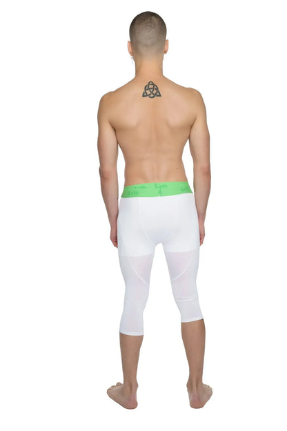 White capri-length performance yoga leggings in arctic white with a bright green elastic waistband for comfort
