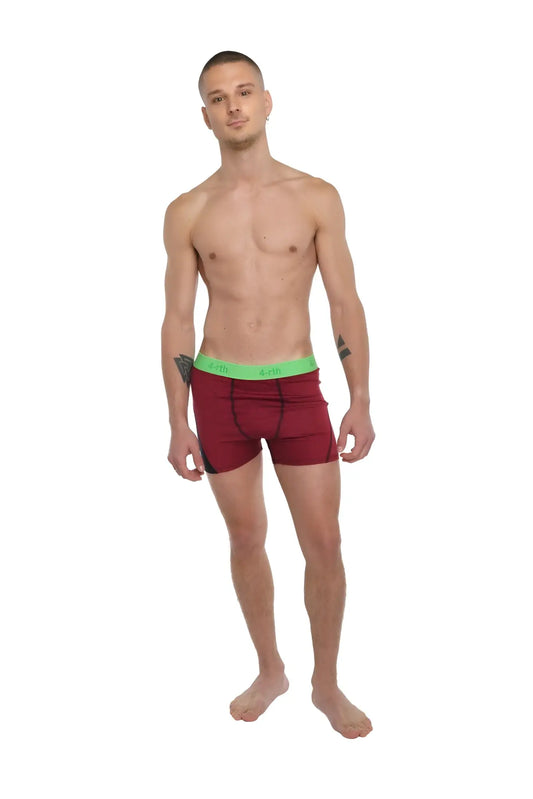 Performance yoga leggings short brick red heather with maroon boxer briefs and bright green elastic waistband visible