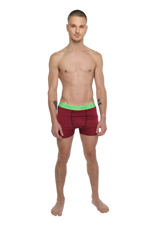 Performance yoga leggings short in brick red heather with a bright green elastic waistband for active wear