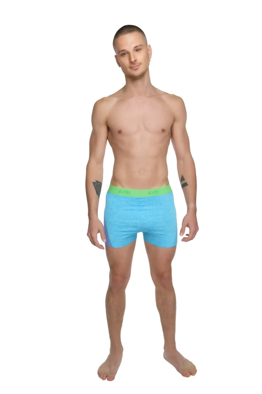Light blue boxer briefs with bright green waistband shown with performance yoga leggings short coral heather background